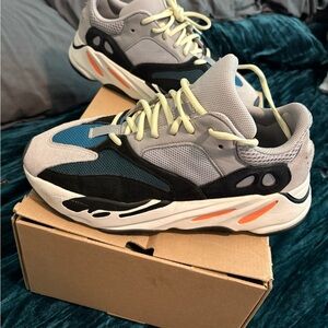 Yeezy Gray and Black Sneakers with Orange Accents